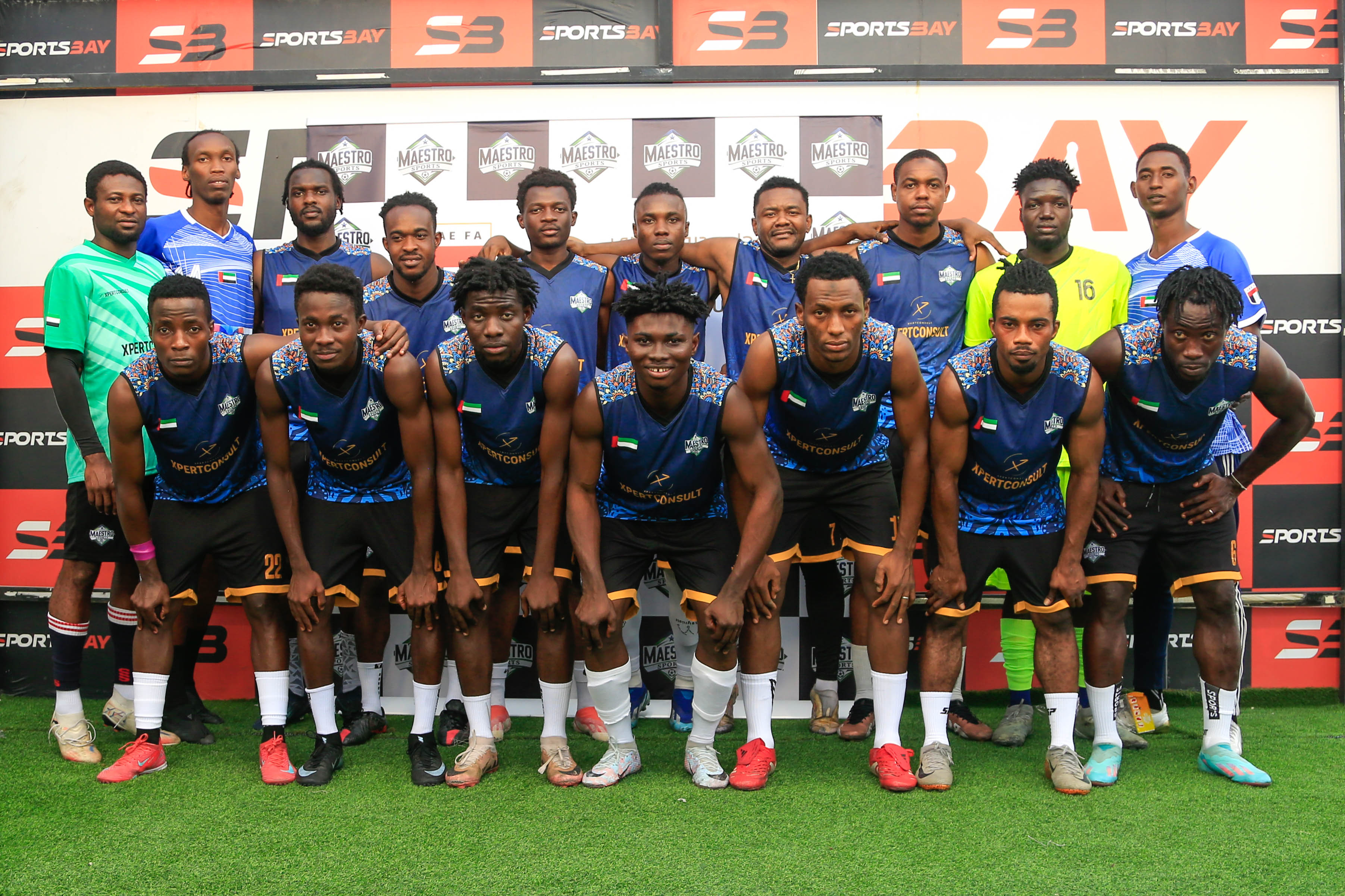 Group photo of players in blue kits