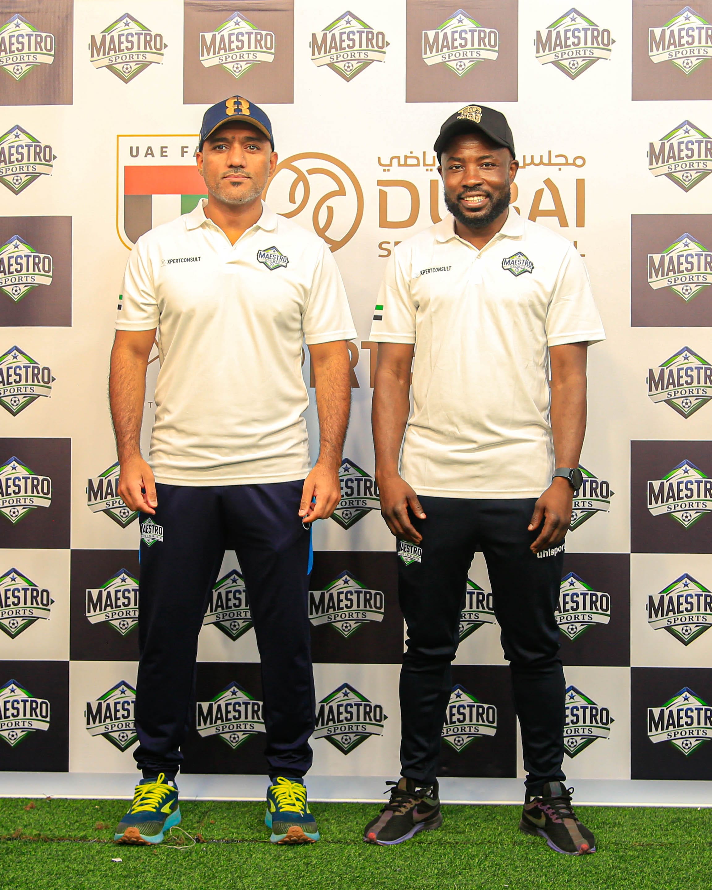 Maestro CEO and manager in white kits